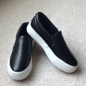 Black slip on sneakers
